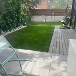 Glass And Wood Designer With Garden In Centertown