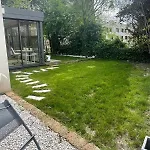 Glass And Wood Designer With Garden In Centertown